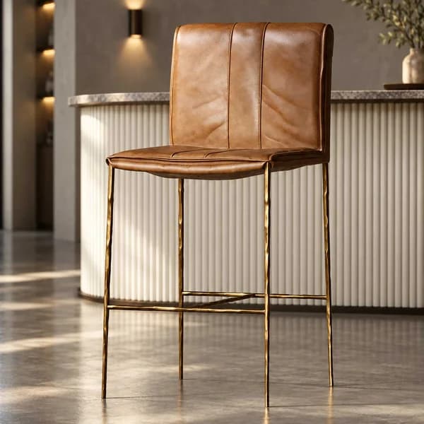 a luxury buffalo-inspired leather stool in warm New Nut Ter, crafted with a plywood frame and sleek powder-coated metal legs.